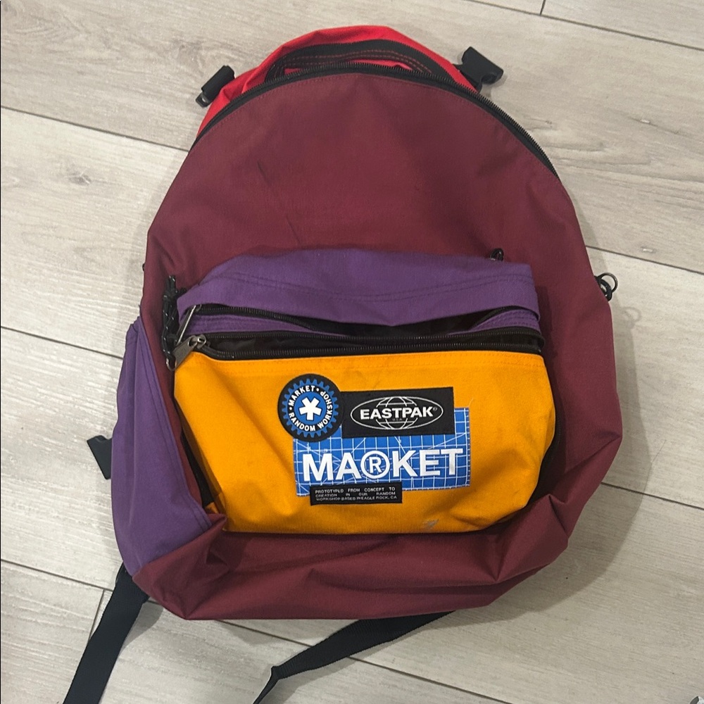 Eastpak Purple and Orange Backpack for Men